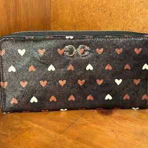 Faux cow hide clutch with hearts